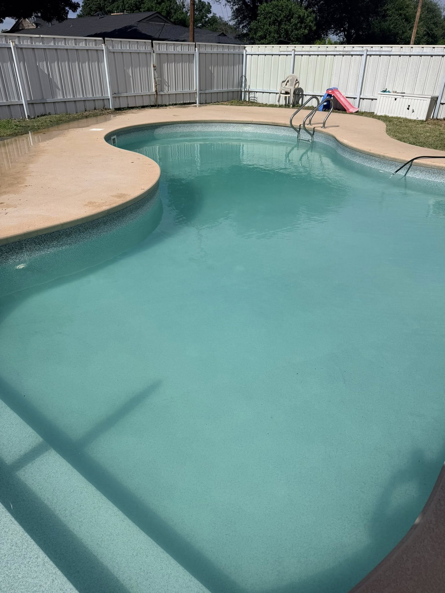 Cloudy pool restored to crystal clear after a weekly service start — after