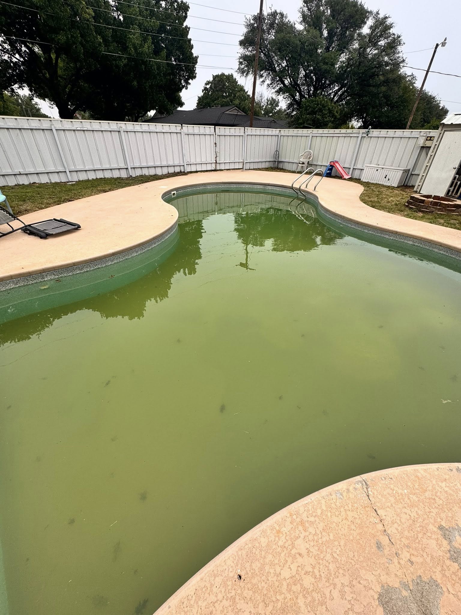 Cloudy pool restored to crystal clear after a weekly service start — before